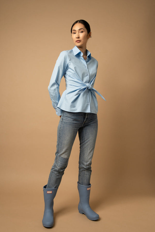 The button-up tie-front shirt also comes in light blue.